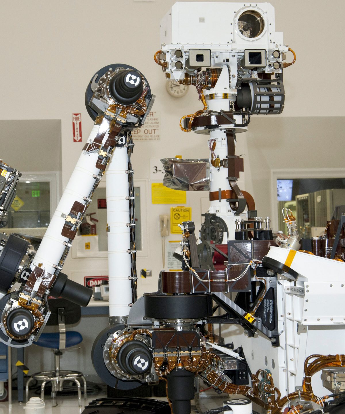 NASA's Curiosity rover, with its robotic arm built by Maxar to withstand the Martian environment.