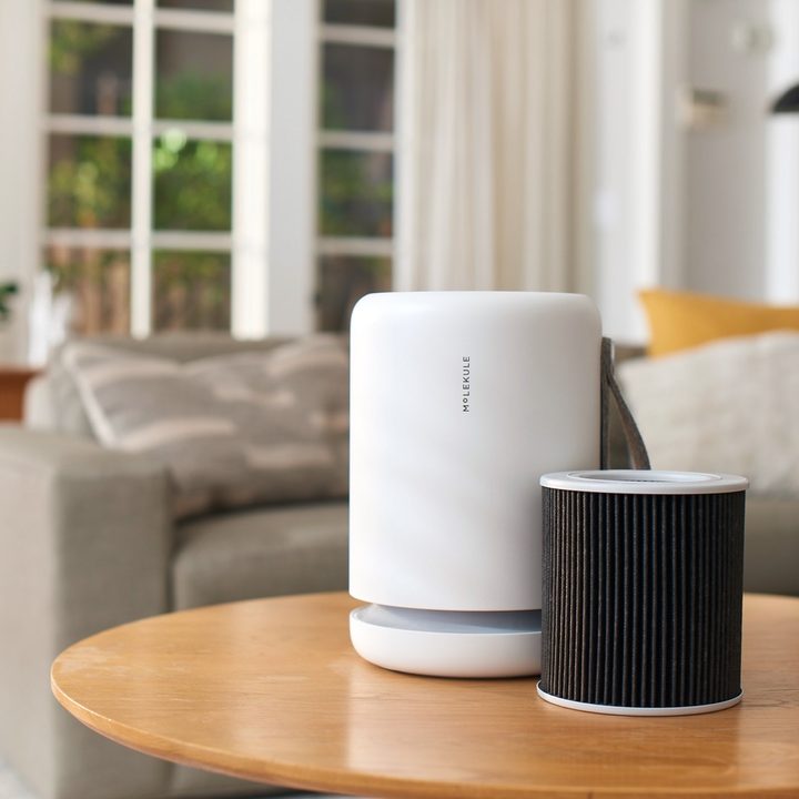Air purifier and filter on a table.