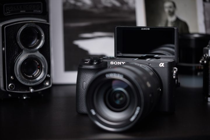 Sony A6600 front with flip screen raised in selfie position