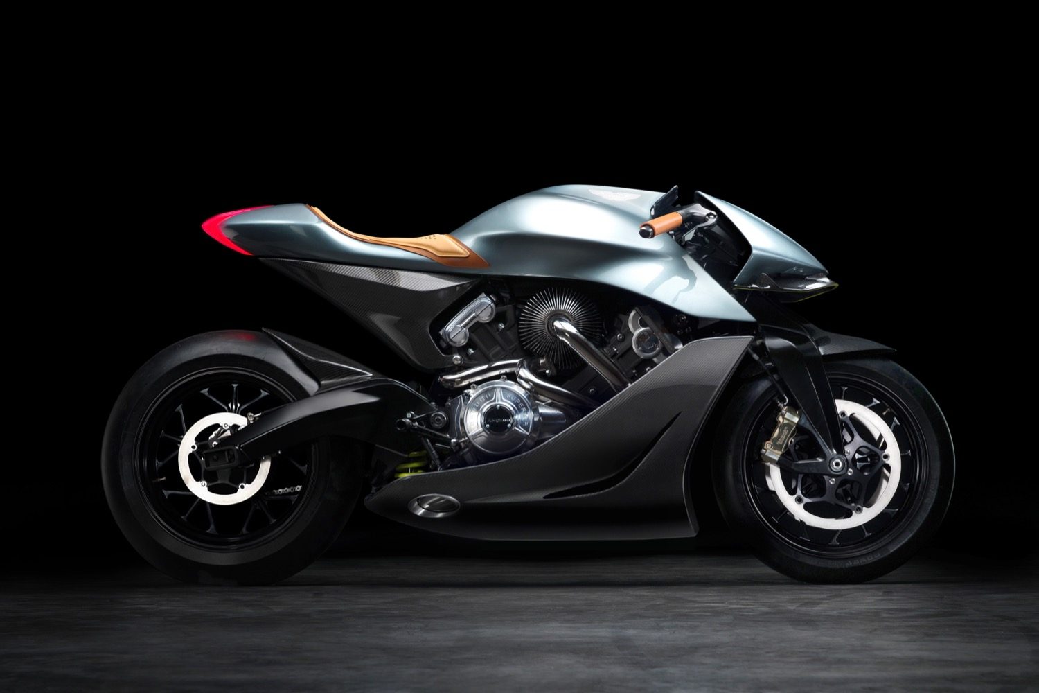 aston martin launches its first motorcycle amb 001 by and brough superior