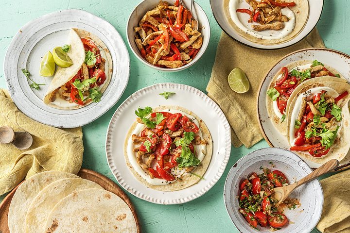 Meals by HelloFresh spread out on a counter.