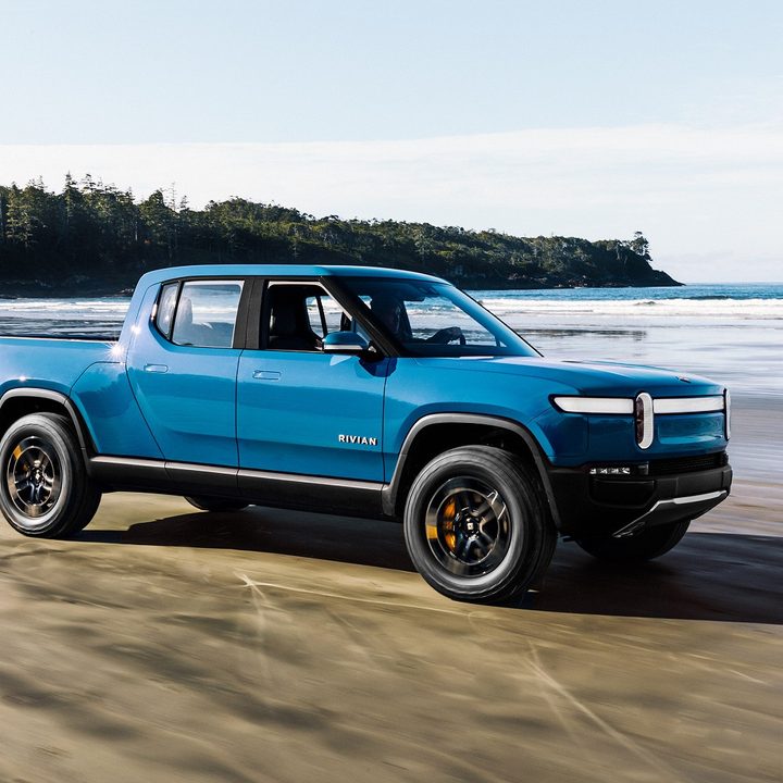 Rivian R1T on a beach