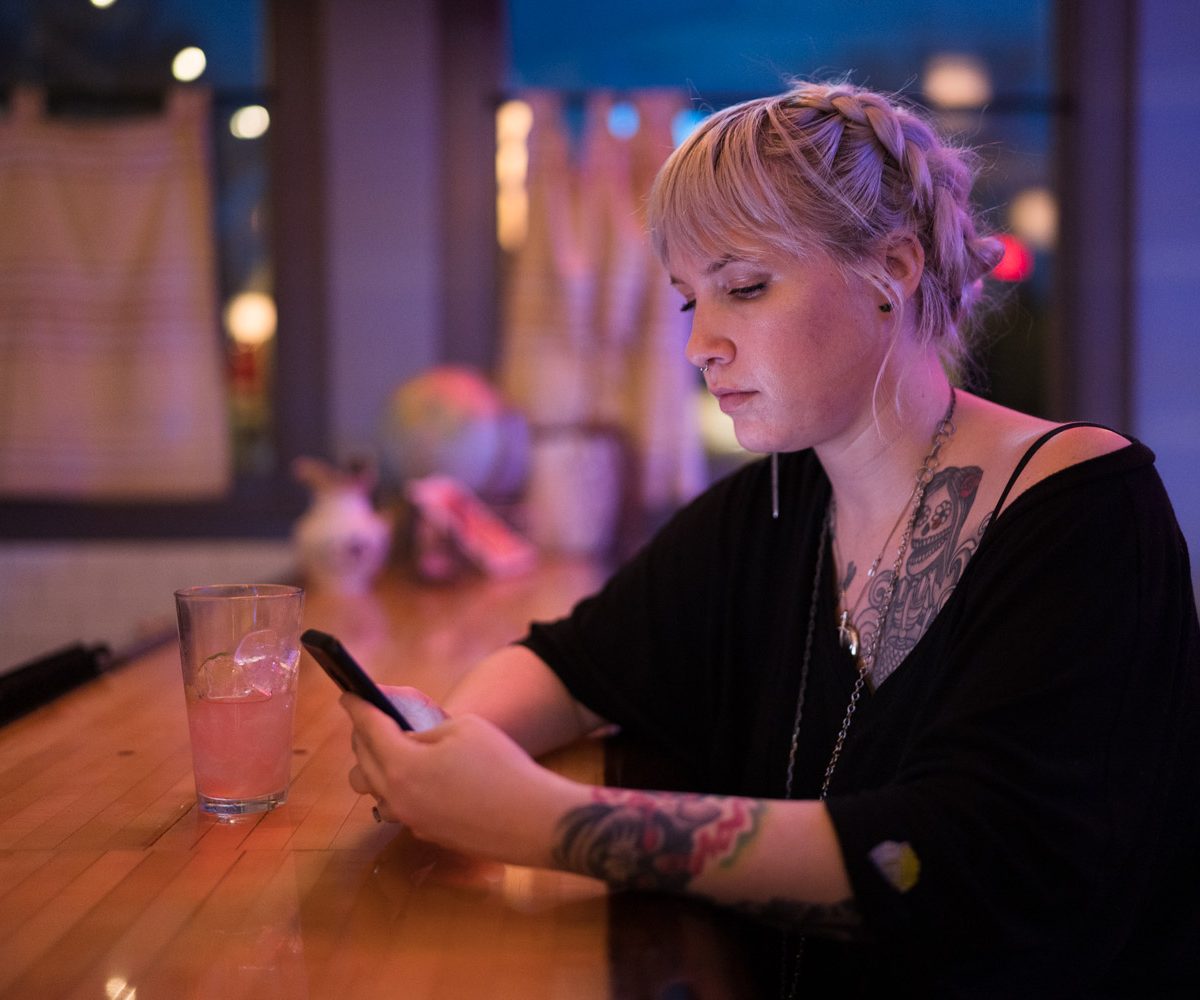 Indoor portrait shot with Sigma fp showing visible exposure banding in background.