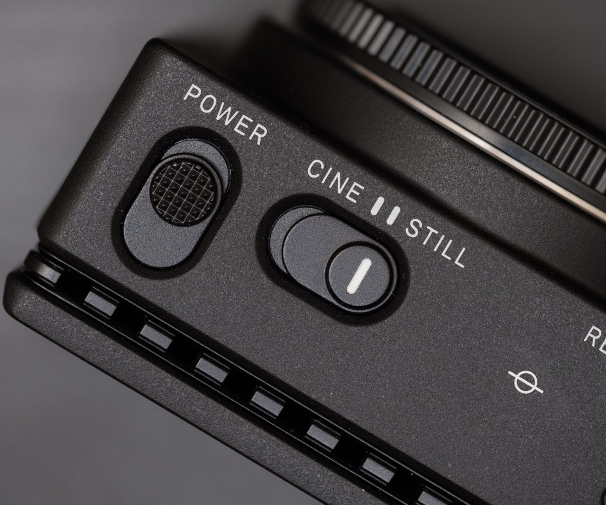 Sigma fp detail shot of power and cine/still switches.