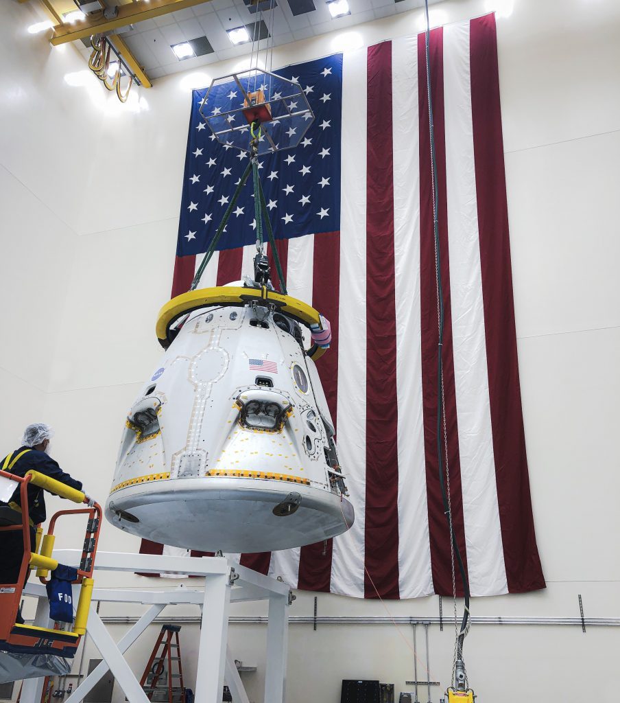 SpaceX Crew Dragon spacecraft inside of a SpaceX processing facility at Cape Canaveral in Florida.