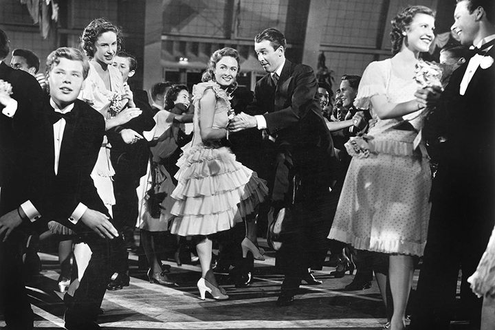 A man and woman dance.