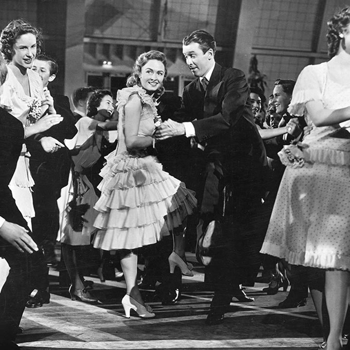 A man and woman dance.