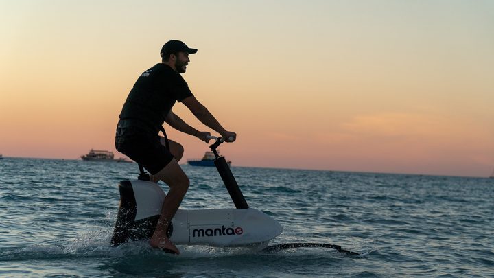 manta5 hydrofoil ebike at sunset