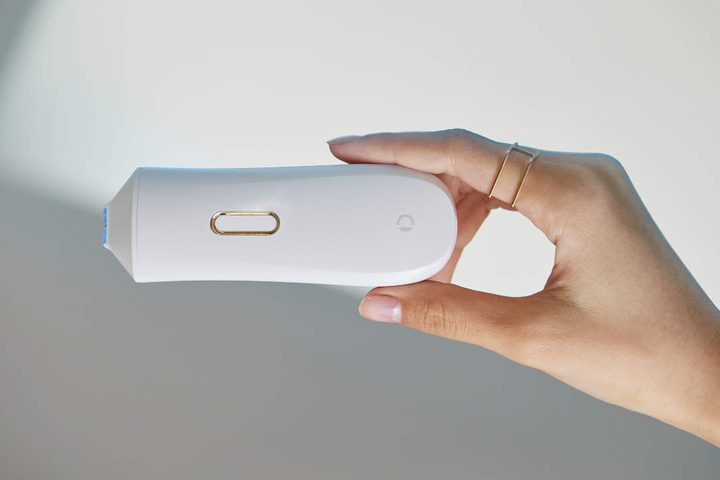 Opte Percision Skincare CES 2020 with hand