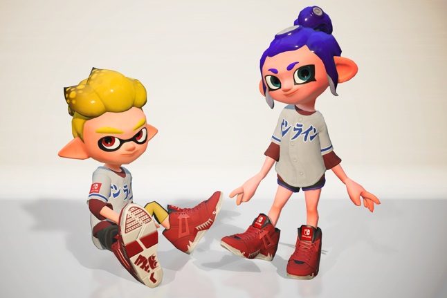 Splatoon 2 characters wearing exclusive gear.