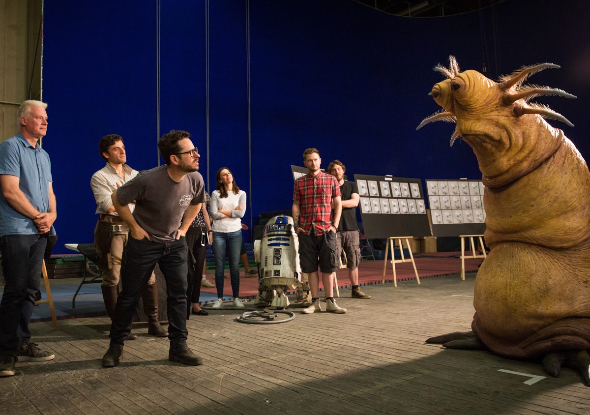 J.J. Abrams, Oscar isaac and Neal Scanlon with Klaud on the set of STAR WARS: THE RISE OF SKYWALKER.