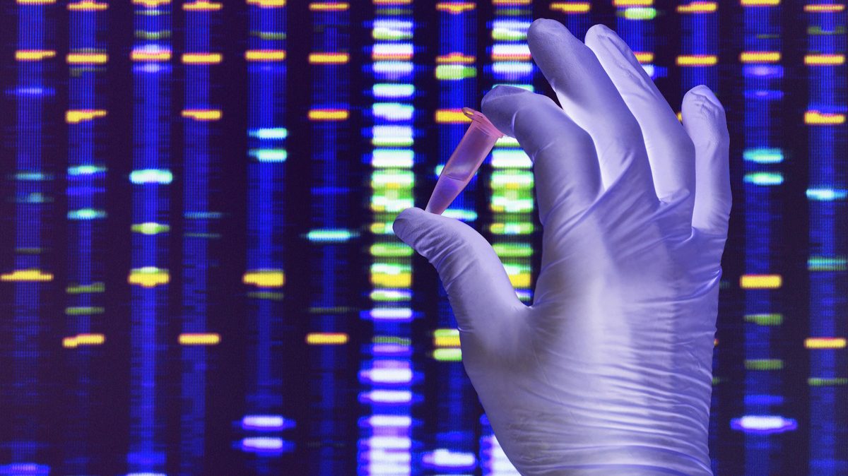 Hand holding DNA tube
