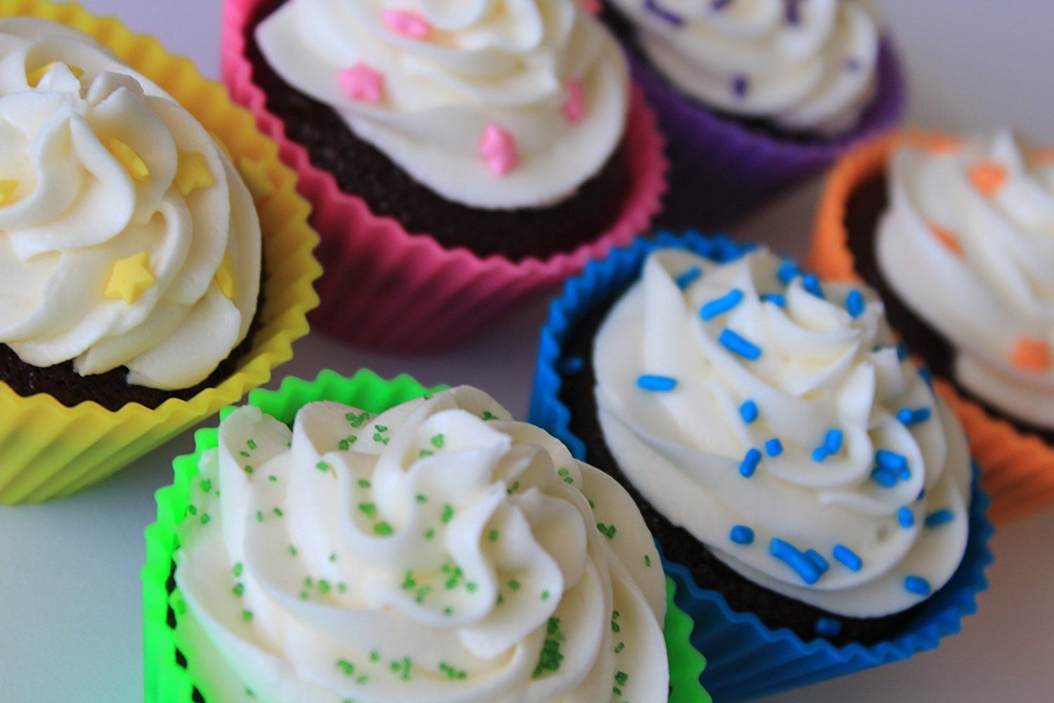 pantry-elements-silicone-cupcake-liners-baking-cups-with cupcakes in them