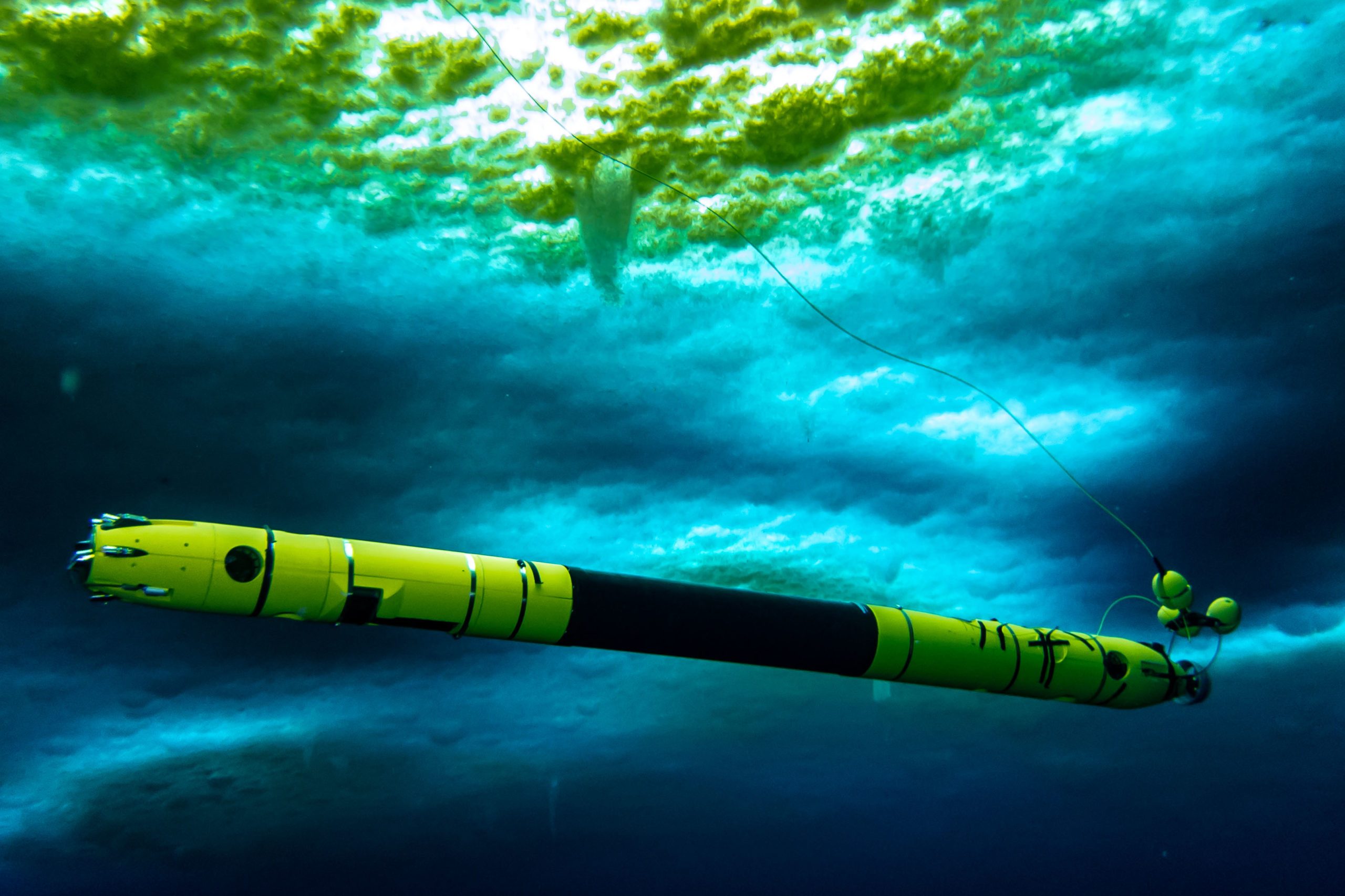 Icefin under the McMurdo sea ice in Antarctica. Photo from Rob Robbins, USAP Diver