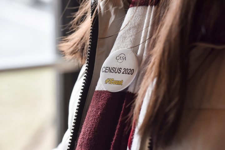 US Census 2020 Button on woman's jacket