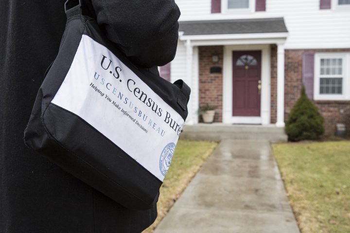 US Census Bureau Canvasser Walking Up to House 1