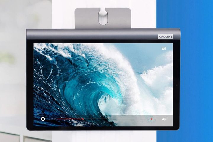 Yoga Smart Tab hanging from a wall
