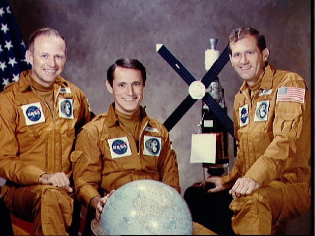 Official photo of the Skylab 4 crew of (l to r) Gerald Carr, Edward Gibson, and William Pogue.