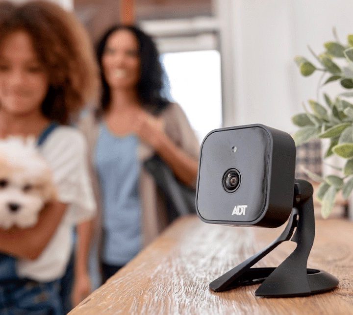 An ADT Blue security cam set up in a home.