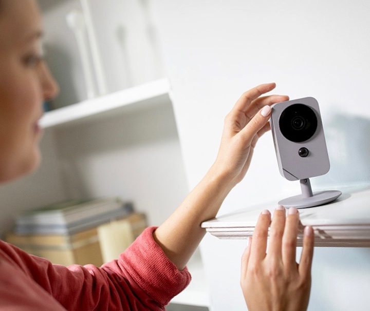 Setting up an ADT Blue cam on a mantle.