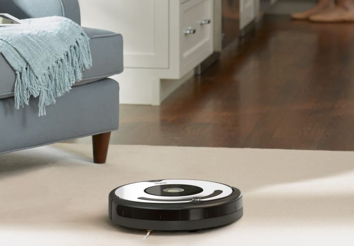 iRobot Roomba 670 vacuum cleaner cleaning a floor.