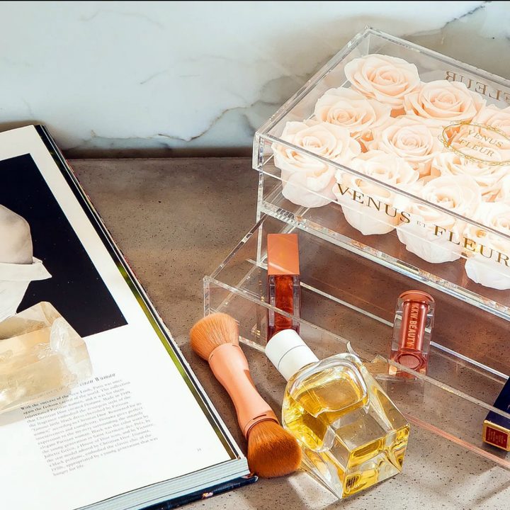roses in a box with perfume