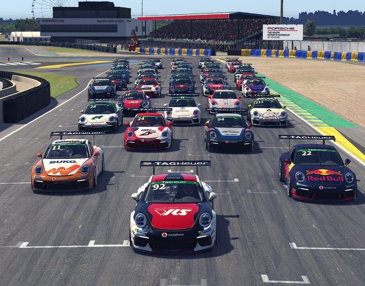 iRacing cars near the starting line.