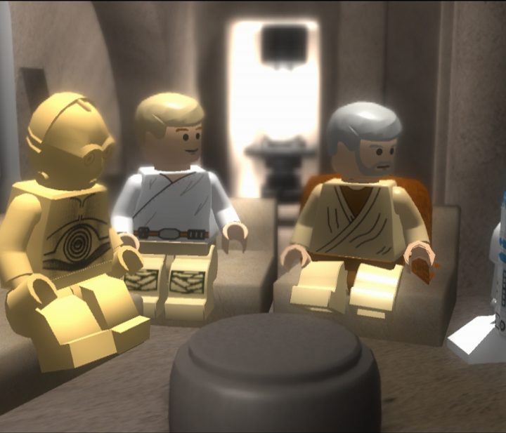 Lego versions of Star Wars characters sitting at a table.
