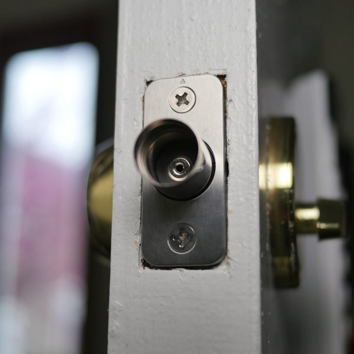 Level Lock hollow deadbolt and battery compartment shown.