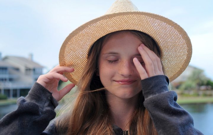 Young girl in sunhat
