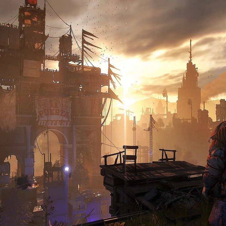 The sun sets over the city in Dying Light 2.