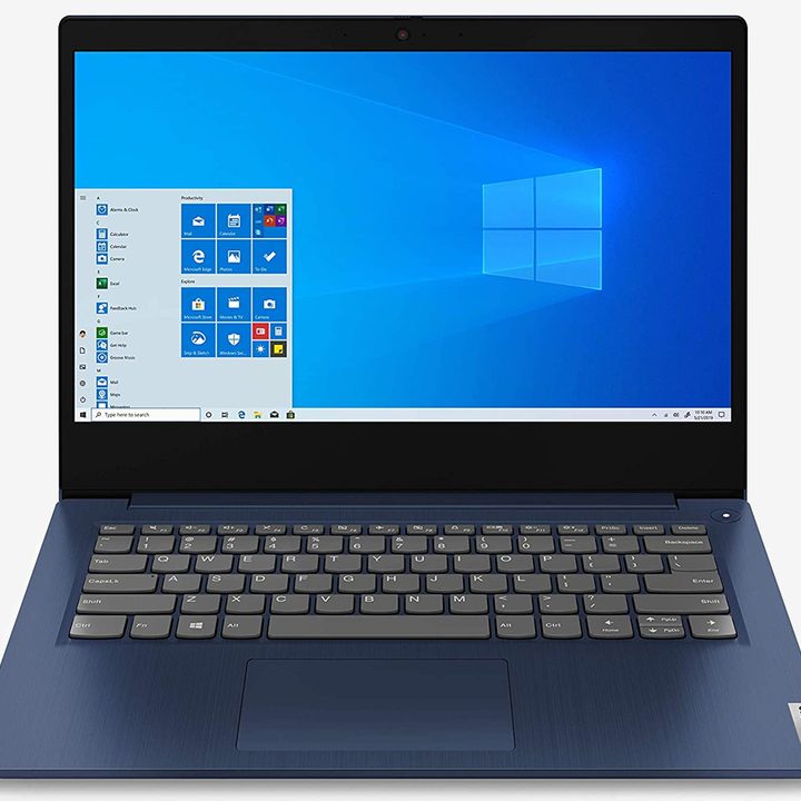 The Lenovo IdeaPad 3 laptop with the Windows home screen on the display.