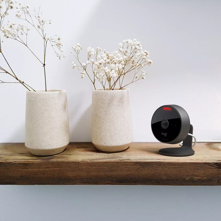 Logitech Circle View smart security cam perched on shelf.