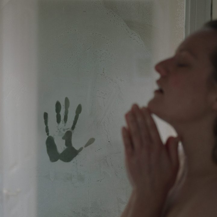 Cecelia in a shower in "The Invisible Man" on Amazon Prime.
