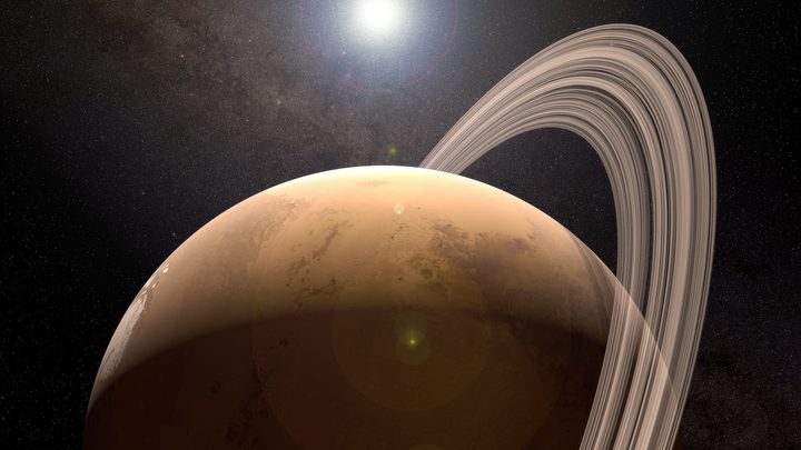 Rendering showing a planetary ring system over Mars.