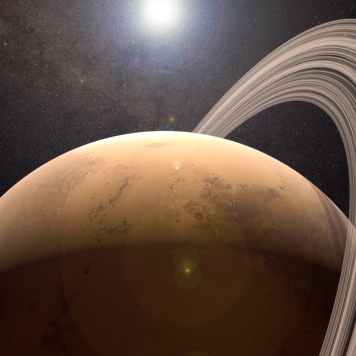 Rendering showing a planetary ring system over Mars.