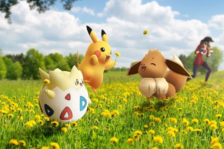 Togepi, Pikachu and Eevee in a field