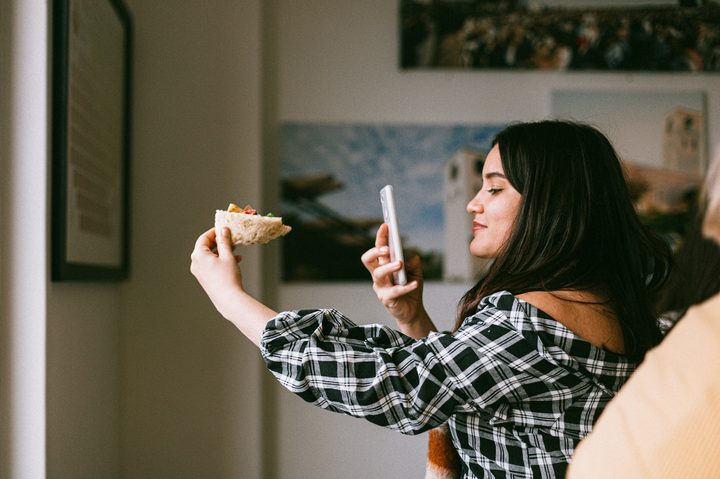 Woman making an Instagram Live video
