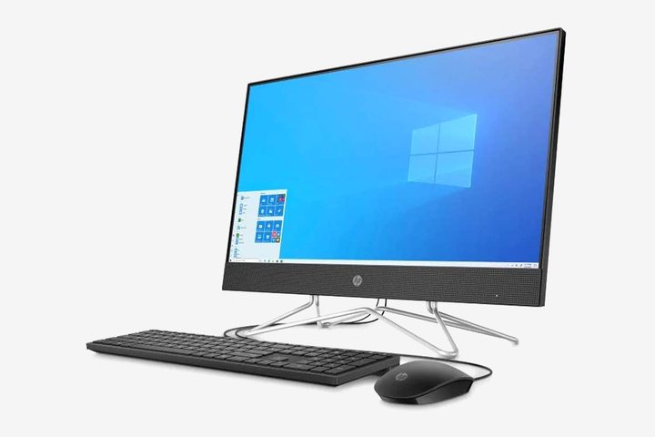 The HP All-in-One 24 desktop computer with a mouse and keyboard.