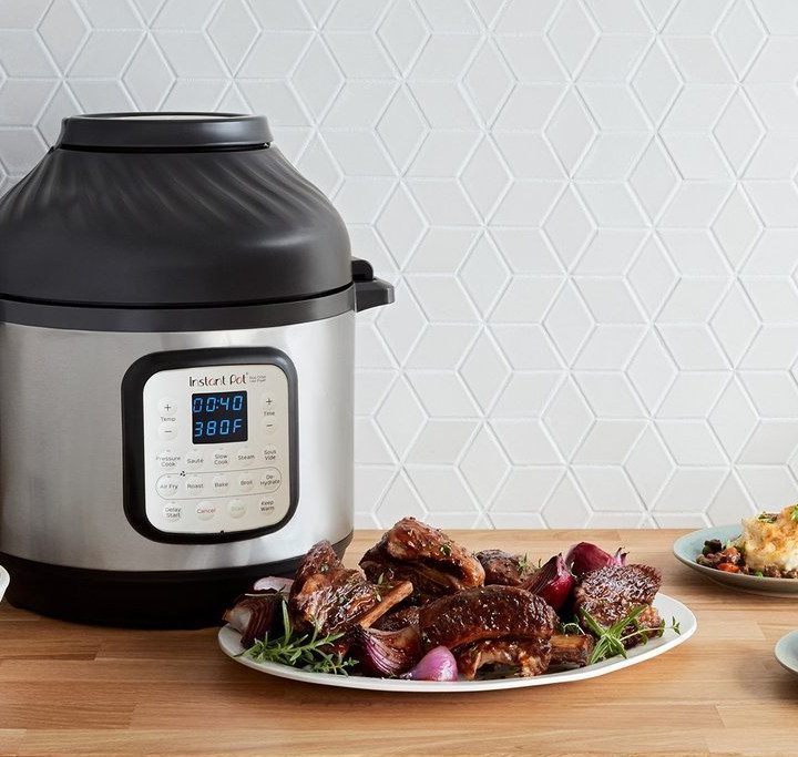The Instant Pot Duo Crisp with food at the side.