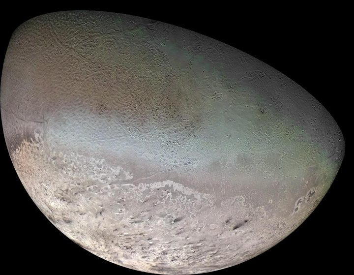 This global color mosaic of Neptune's moon Triton was taken in 1989 by Voyager 2 during its flyby of the Neptune system.