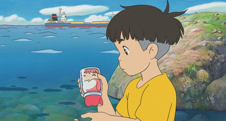 A kid holding Ponyo in a glass jar by the sea.