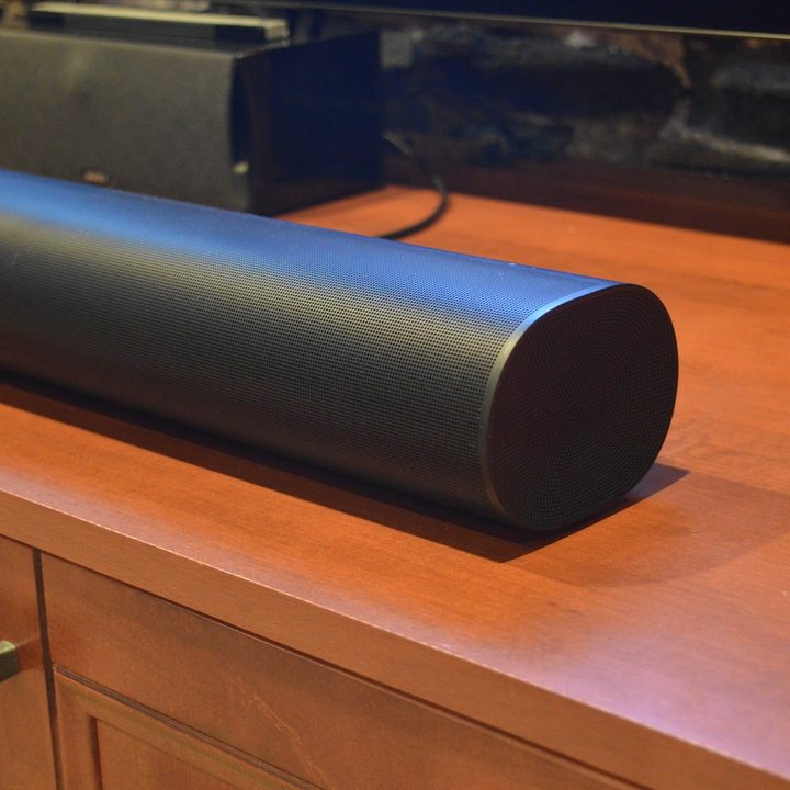 A Sonos Arc Dolby Atmos soundbar on a media console.