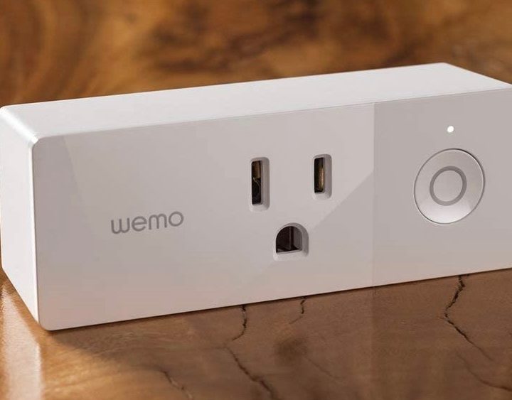 A Wemo Indoor smart plug on a table.