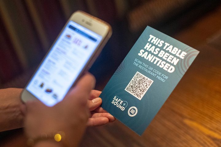 A QR code opens a digital restaurant menu