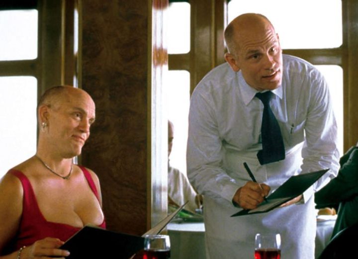 Two John Malkovichs in "Being John Malkovich."