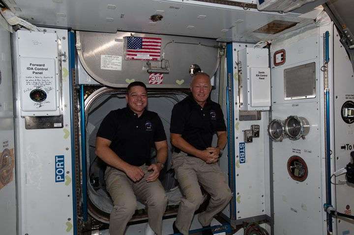 NASA astronauts Bob Behnken (left) and Dou Hurley (right) aboard the International Space Station