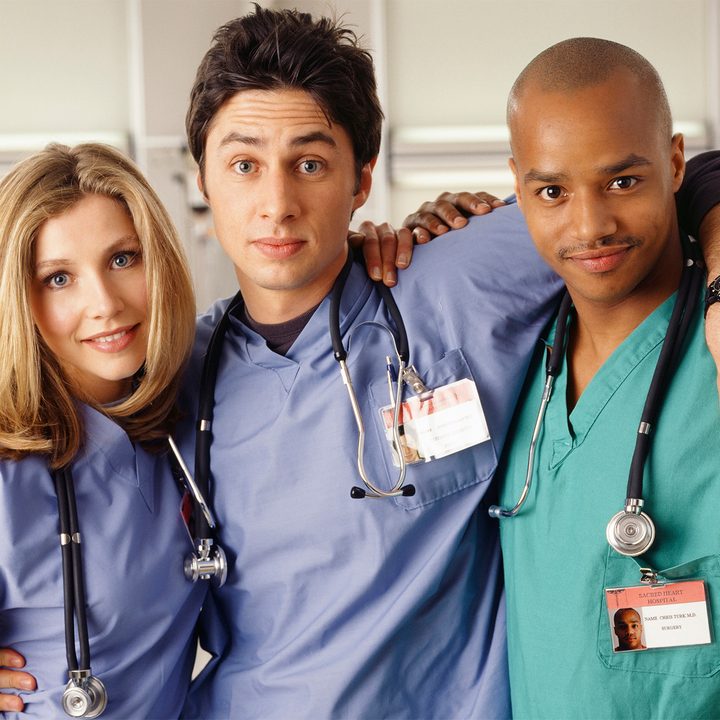 Three doctors pose in Scrubs.