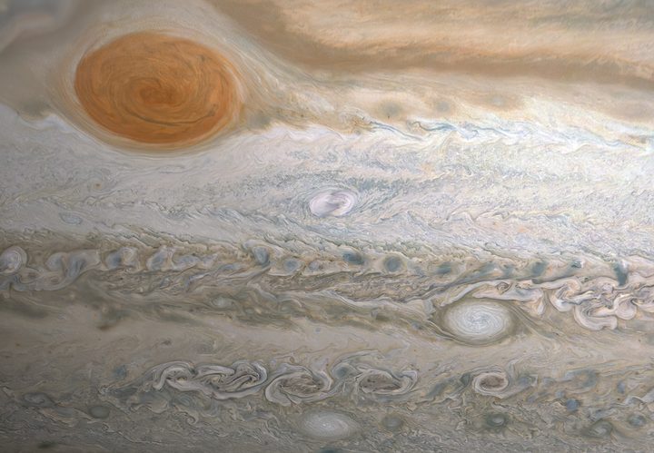 This image from NASA’s Juno spacecraft captures several storms in Jupiter’s southern hemisphere