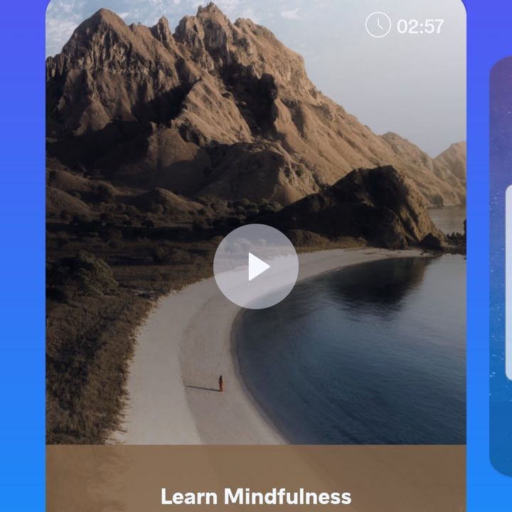 Screenshot of Meditopia app showing an intro to Mindfulness video and a picture of a jogger on a road passing through mountains